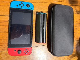Nintendo switch with 128 gb sd card, case and dock