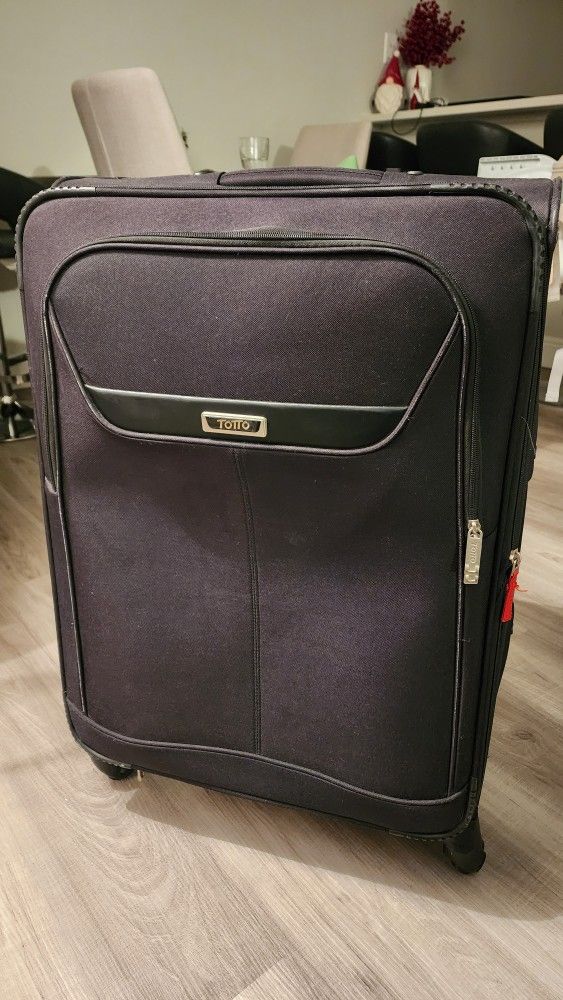 Totto's Large Suitcase In Perfect Shape