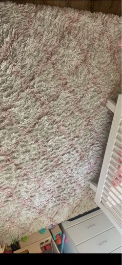 Make a offer 5.5ft  by 7.5 ft Pink and White Shaggy Area Rug make a offer OBO