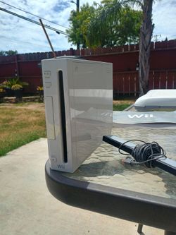 Nintendo Wii with 5 games