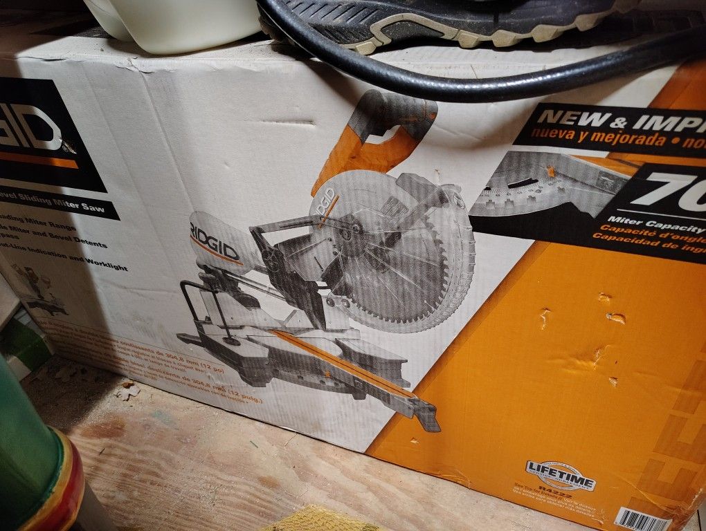 Ridgid 15 Amp Corded 12 in. Dual Bevel Sliding Miter Saw with 70 Deg. Miter Capacity and LED Cut Line Indicator