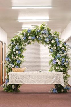 Wedding flower arches and arrangements