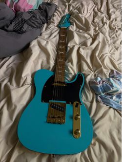 Guitarra nueva dos veces usada