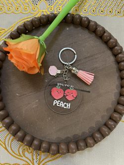 Peach Keychain with Pink Tassel