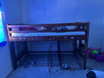 Full bunk bed with space at the bottom and dresser
