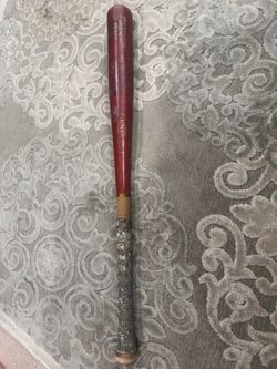 Louisville Slugger Wood bat.