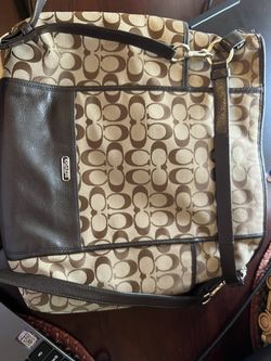 Coach Signature canvas crossbody/shoulder bag in brown khaki with leather trim.