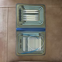Interchangeable Knitting Needles And A Box Of Yarn