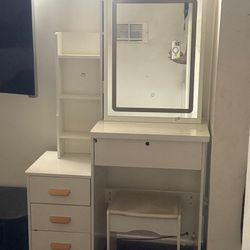 chest of drawers with mirror and chair