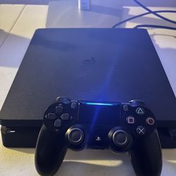 PS4 w/ Controller & Game