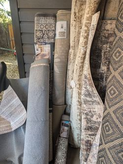 Garage sale. Furniture, pressure washers, rugs, luggage.