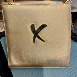 Beautiful gold purse with X logo