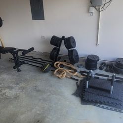 Weight Bench, Weights , and Various Accessories .