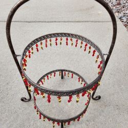 serving stand
metal & beads
diameter: 10.5"
height: 21"
$5