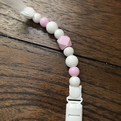 Feeder And a Pacifier Holder