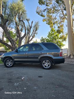 2006 Accura MDX 
Automatic 
runs very good 
no isues
Clean title
current tags 
AC WORK
Motor  3.7  L V6
2 new tires
4 WD
ac cold
Over 200kxxx MILES ,b