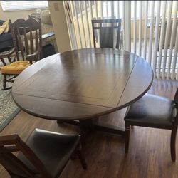 Dining Table And 4 Chairs . Price Including Delivery 