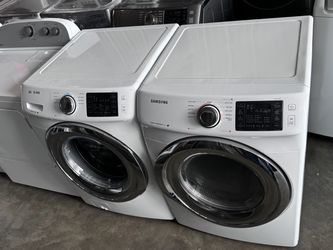 White color  front load Samsung washer and dryer electric high efficiency working perfectly with warranty extra for delivery same day delivery and ins
