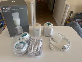 Munchkin portable milk warmers