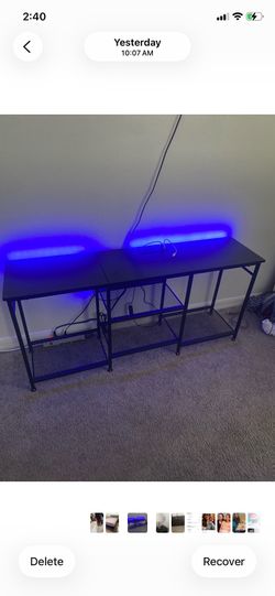 Small wall cabinet with neon lights has charger