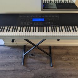 Casio Semi Weighted 76-Key Electronic Piano Keyboard  - 76 Touch-Sensitive keys, 600 tones, 180 rhythms, Midi + Stand/Power Cord (WK-220 MSRP $499)