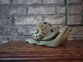 Snail votive