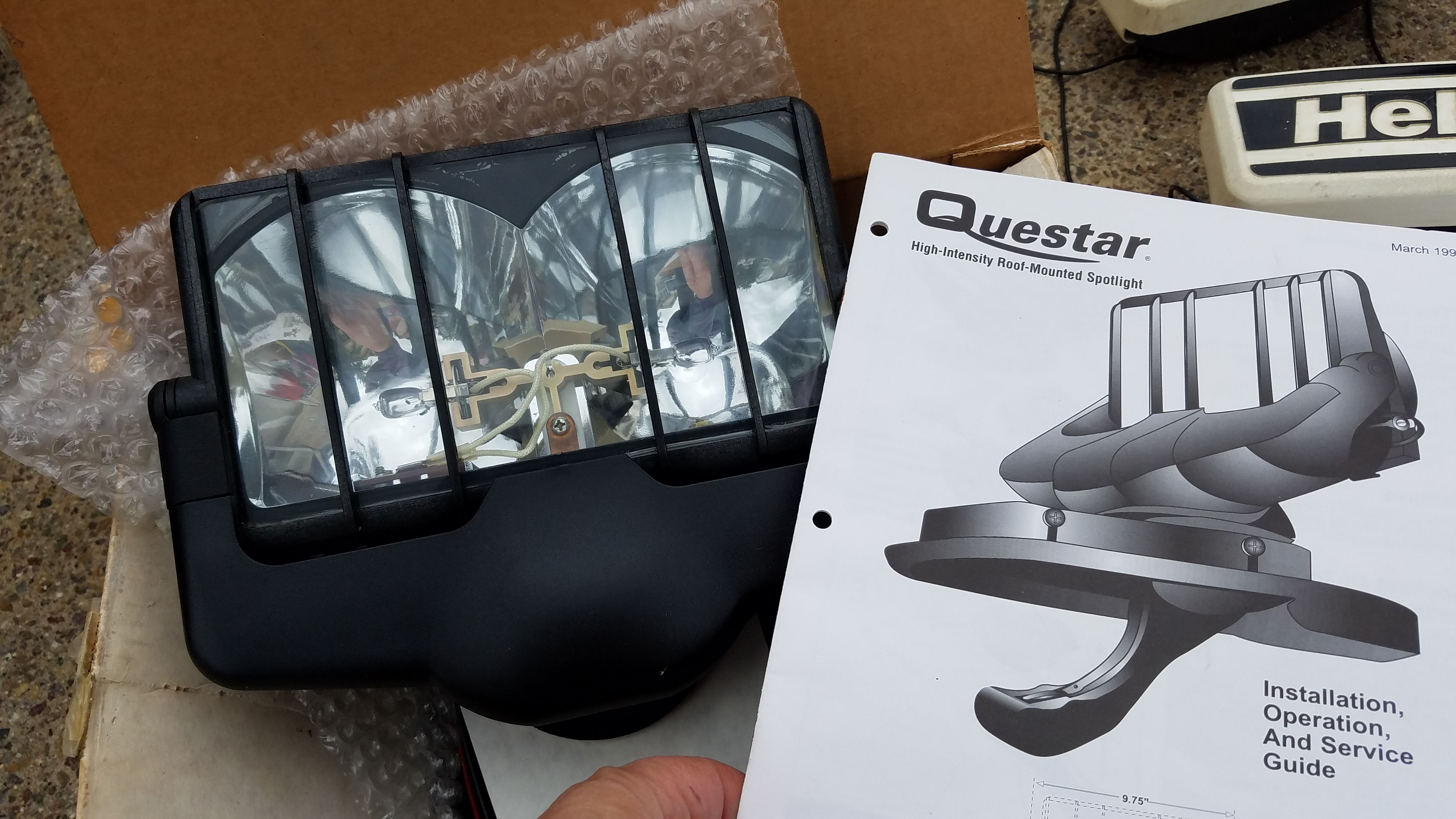 Questar Search Light $25 must install through a small hole in your car's roof