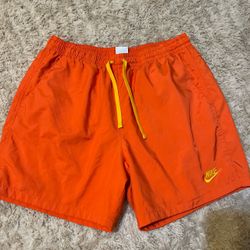 Nike Orange Shorts with Yellow Drawstring