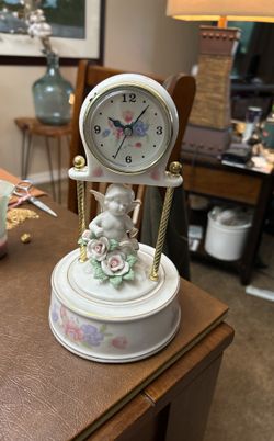 Porcelain Clock With Cherub