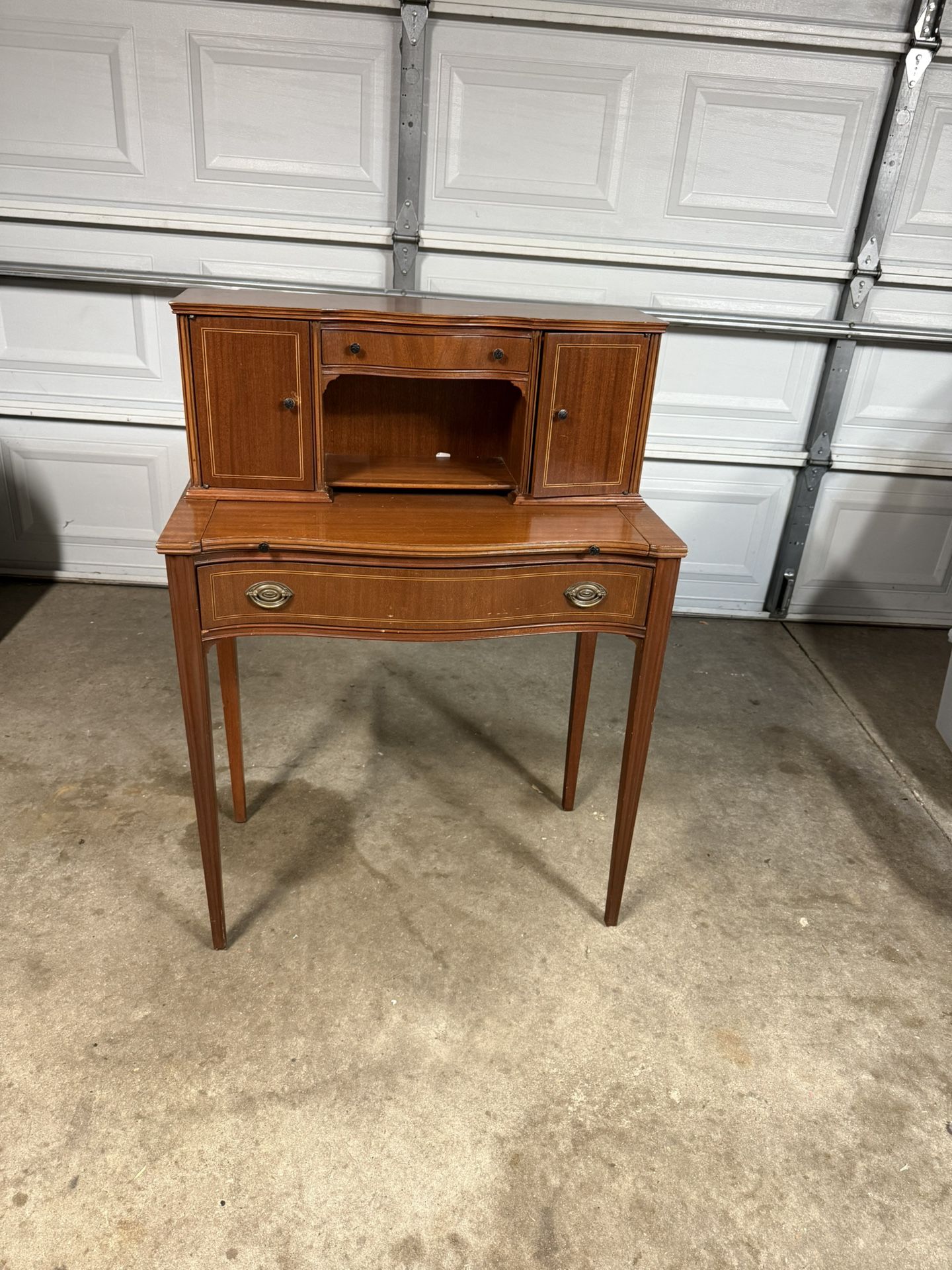 BEAUTIFUL VINTAGE SECRETARY DESK IN GOOD CONDITION. IT MEASURES 42 W,16 D AND 30H. $100.00 OR BEST OFFER.
