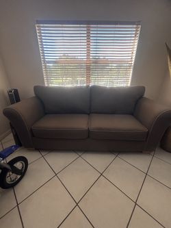 Green two seat couch Good condition