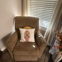 Dark Gray sectional couch with tan chair and wood table