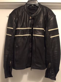 Leather motorcycle jacket with safety padding