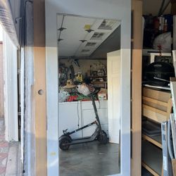 White door with mirror on both sides, measuring 36 by 80