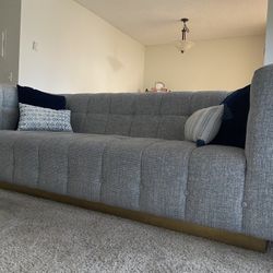 Grey Couch With Gold Rim