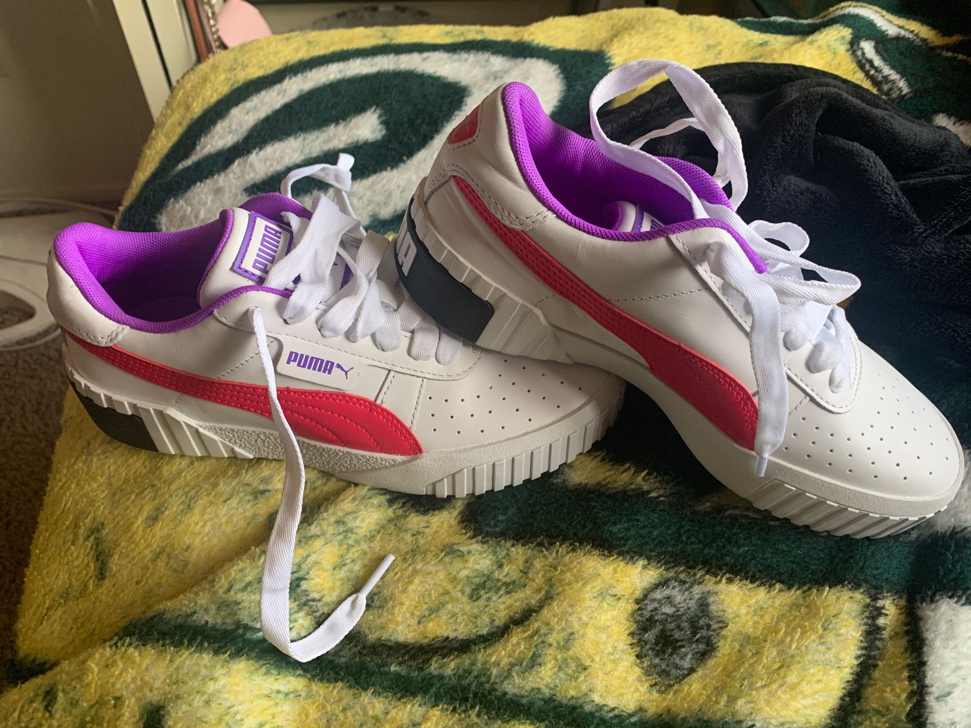 2 Pairs of Woman’s Puma’s size 7 &10
