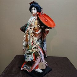Vintage Japanese Oyama Geisha / Kabuki Dancer Ningyo Doll with Tsuzumi Drum and Floral Branch (Mid-to-Late 20th Century)