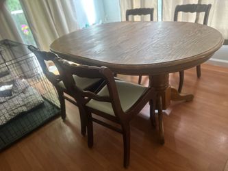 Oak dining table and chairs