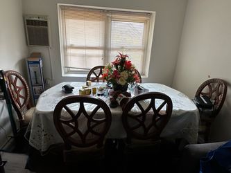 Handcrafted Solid Wood Dining Table & 6 Chairs - $500