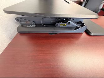 Rising desk stand