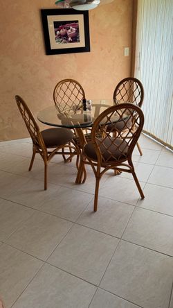 Glass breakfast table with 4 chairs
