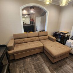 Sofa With Storable Ottoman That Converts To Bed