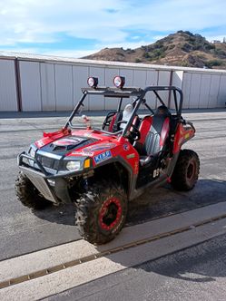 The greatest toy for the summer side by side RZR 800 with a custom built brand new engine for racing 900cc with every upgrade in the catalog