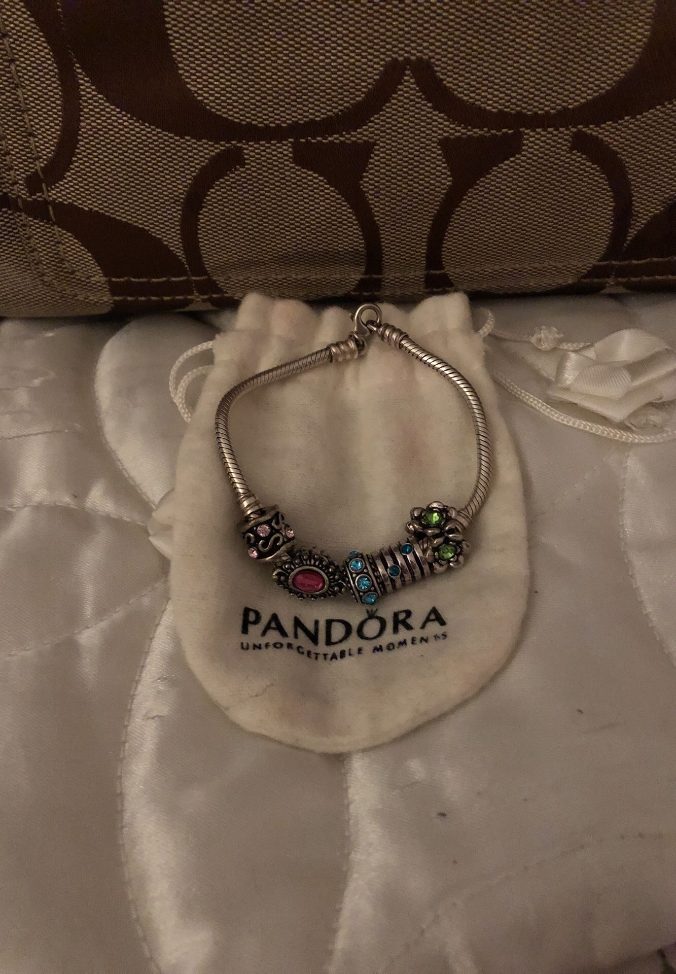 Pandora bracelet charms included with lobster claw