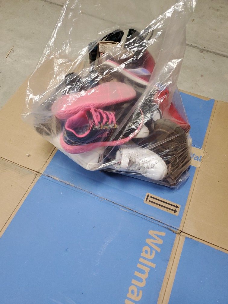 Bag Of Used Girl And Boy Shoes
