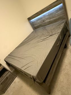 Grey Wood Grain Queen Bed Frame with LED Headboard and Matching 6-Drawer Dresser with Night Stand.