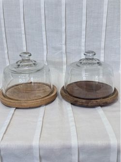 Bell jars with wooden stand.