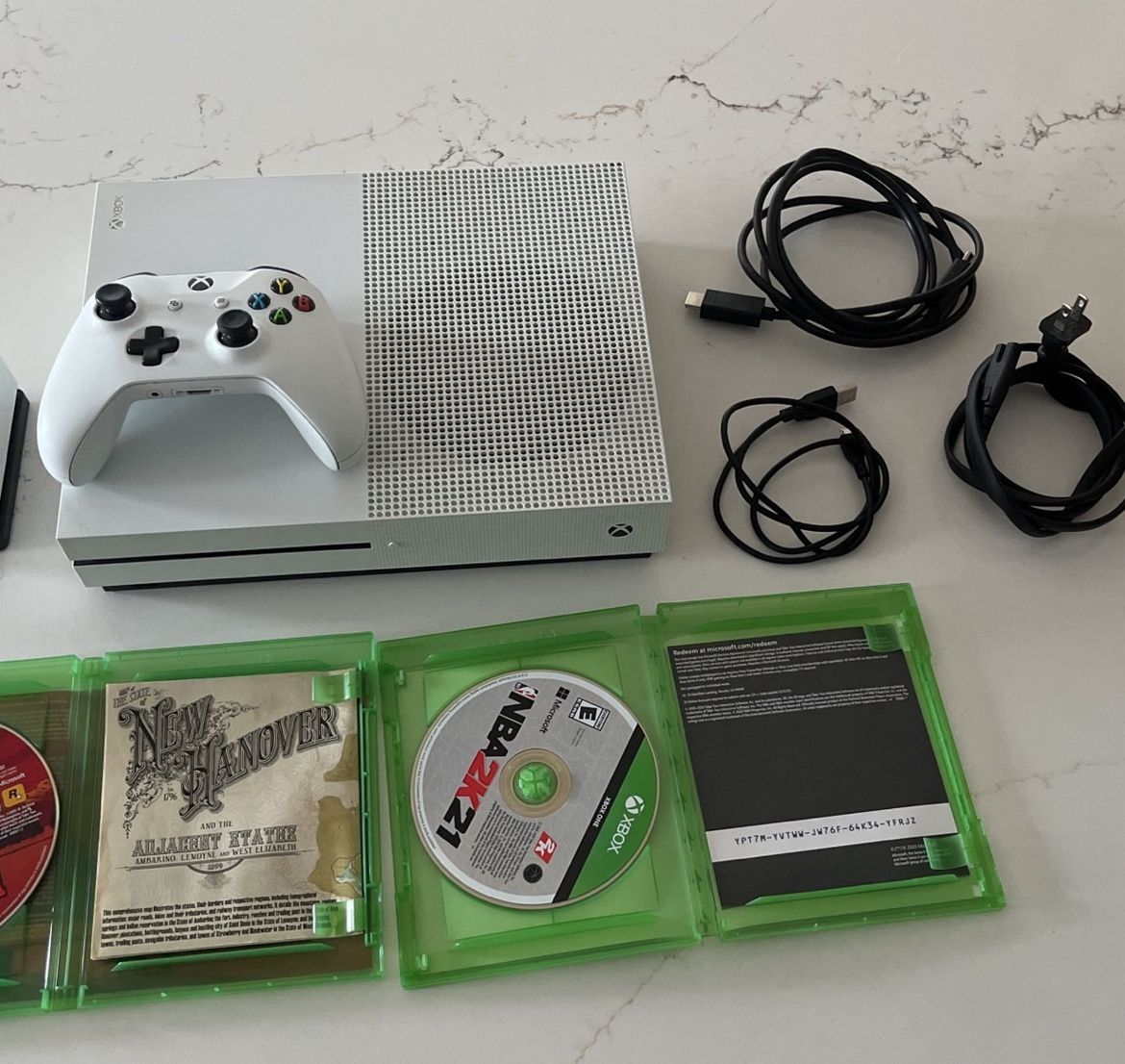 Xbox 1S game console with two games and accessories