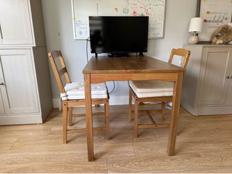 Ikea table with 4 chairs, tv and dvd player