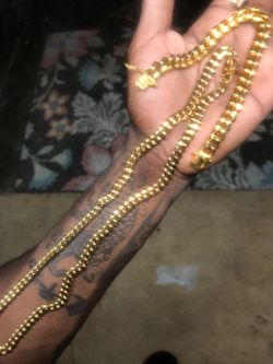 Gold Cuban chain and bracelet
